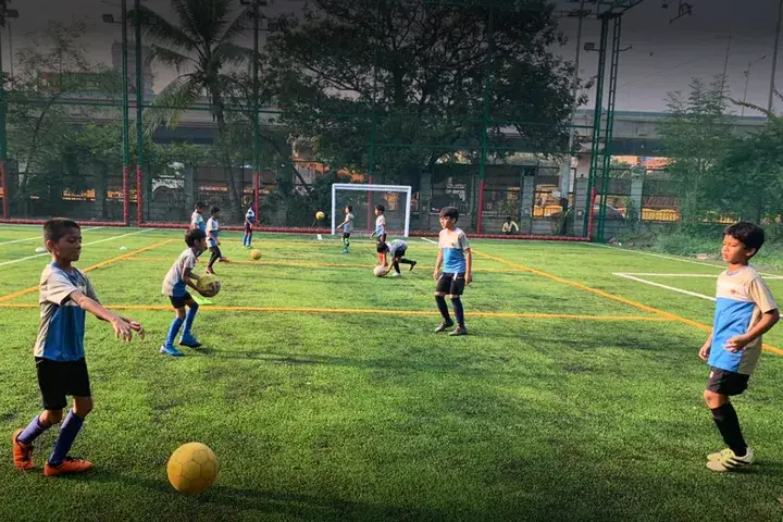 Football players training on a Huddle ground