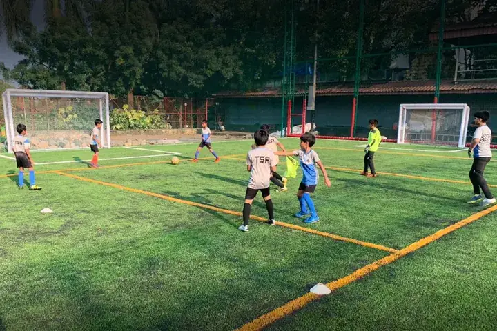 Football coaching session for young players at Huddle